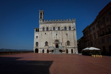 Fototapeta na wymiar Gubbio town hall and square, Palazzo dei Consoli, Italy Medieval building