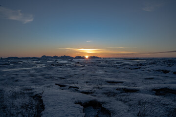 sunset over the frozen sea