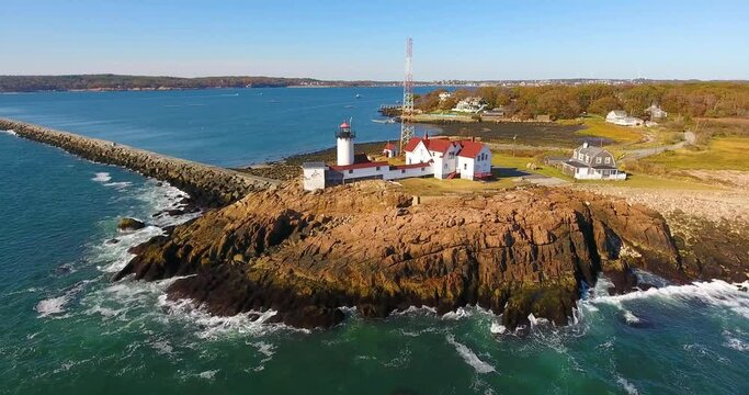 Aerial view of Eastern Point Lighthouse and Gloucester Harbor, Cape Ann, northeastern Massachusetts MA, USA. This historic lighthouse was built in 1832 on the Gloucester Harbor entrance.
