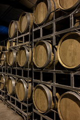 Production of sweet cassis creme liquor and strong marc from ripe black currant berries, distillation and maturation in wooden barrels. Burgundy, France