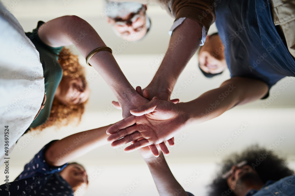 Canvas Prints lets get this project started. low angle shot of a group of cheerful creative businesspeople forming