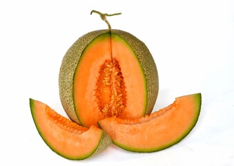 Melon with sweet orange pulp isolated on white background
