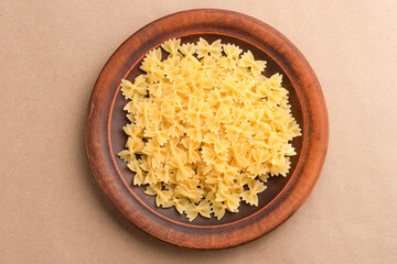 Raw pasta farfalle, Italian pasta, Italian cuisine