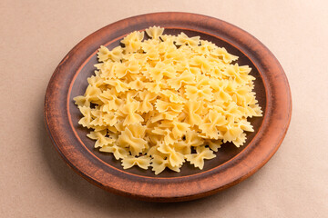 Raw pasta farfalle, Italian pasta, Italian cuisine