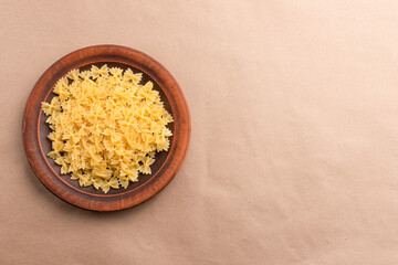 Raw pasta farfalle, Italian pasta, Italian cuisine