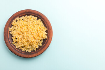 Raw pasta farfalle, Italian pasta, Italian cuisine