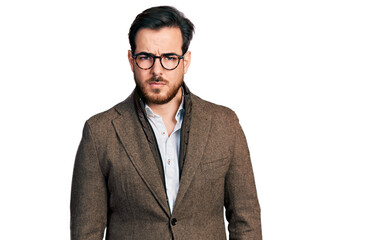 Young hispanic man wearing business jacket and glasses skeptic and nervous, frowning upset because of problem. negative person.