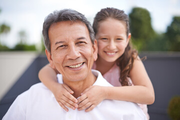 Obraz premium Granddads my hero. Portrait of a young girl and her grandfather spending time together.