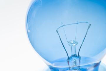 Light bulb on isolated white background. New modern lamp bulb.
