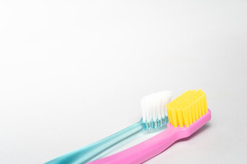 Fototapeta na wymiar 2 different toothbrush. Toothbrush closeup on white background.