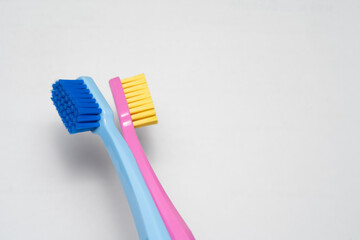 A conceptual of a couple toothbrush in love. Toothbrushes convey the human relationship between a...