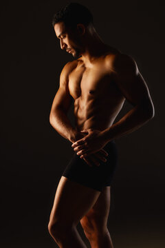 Discipline is the strongest muscle there is. Studio shot of a fit young man posing against a black background.