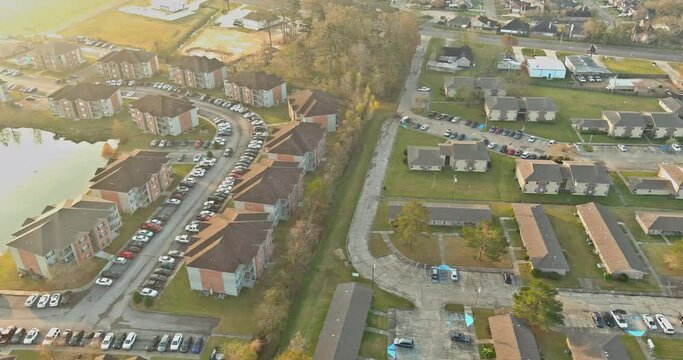Panoramic top view on area urban development residential quarter near small pond in Denham Springs Louisiana USA