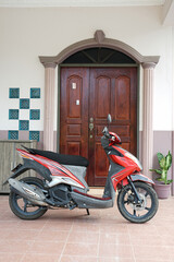 scooter on the front of the door