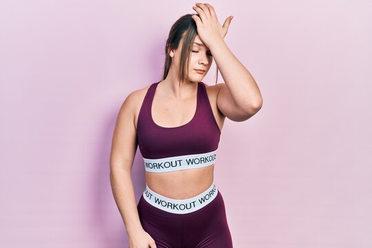 Young hispanic girl wearing sportswear surprised with hand on head for mistake, remember error. forgot, bad memory concept.