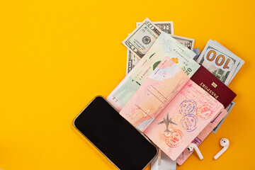 Minimalism. The concept of travel light. Carry only necessary on yellow background for copy space.