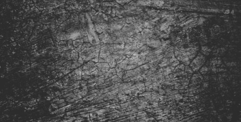 Black concrete wall or dark gray rough grainy stone texture background.