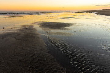 Sunset Over The Tidal Flats of Folly Beach, Folly Island, South Carolina, USA
