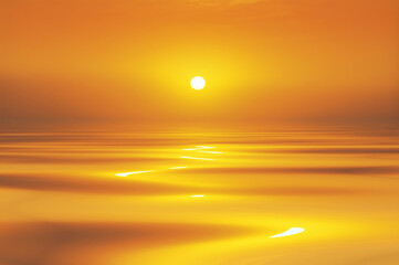 Golden sunset or sunrise reflected on smooth water