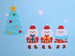 クリスマスプレゼント　三人のサンタクロース　背景水色