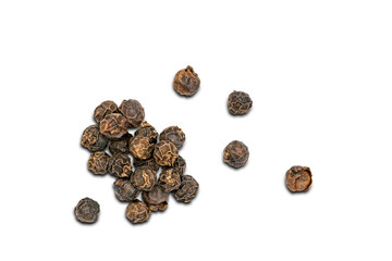 Top view pile of dried natural black pepper seeds on white background.