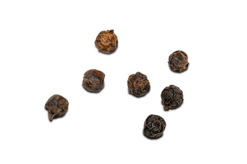 Top view of dried natural black pepper seeds ( Piper nigrum) on white background.