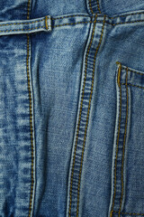 Fototapeta premium stitch on blue jeans textile