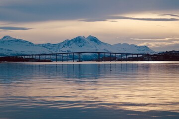 sunset over Tromso Bridge on a sunny winters day