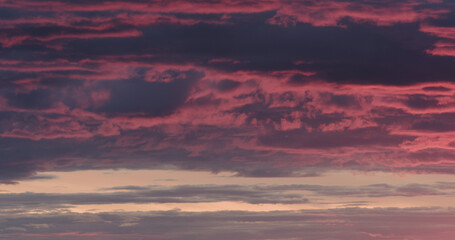 Purple clouds last minutes before sunset