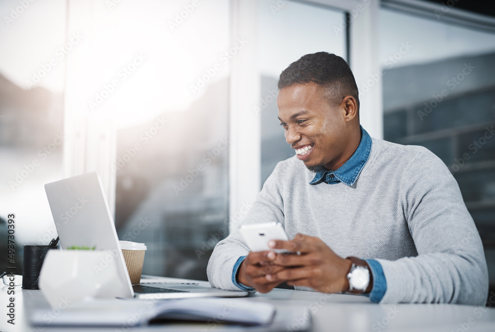 Poster let me send through these details to the client. shot of a handsome young businessman using a cellph