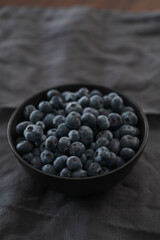 big bowl with blueberries on table