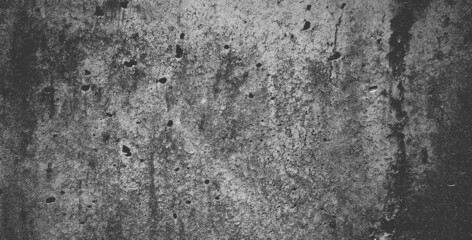 Fototapeta na wymiar Black grainy stone texture backgroundor dark gray textured background.