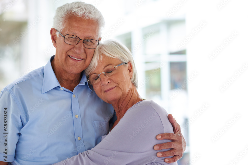 Wall mural Totally content. Portrait of a loving senior couple.