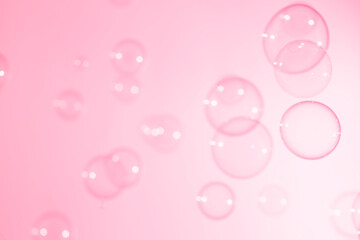 Pink Transparent Soap Bubbles Flaoting in the Air.