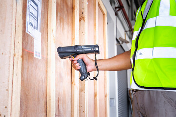 Workers Scanning Bar Code Scanner on Label Cargo Shipping. Warehouse Inventory Management....