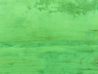 Fototapeta na wymiar An old green wooden wall with a horizontal pattern. Vintage green background with wooden texture. 