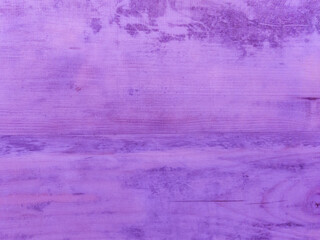 An old purple wooden wall with a horizontal pattern. Vintage purple background with wooden texture.
