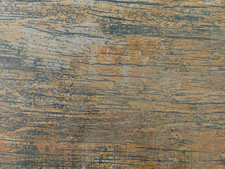 An old wooden wall with horizontal cracks and scuffs of gray-brown color. Vintage background with wooden texture.
