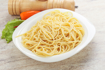 Italian pasta boiled spaghetti with oil