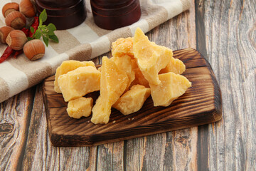 Crushed hard parmesan cheese pieces