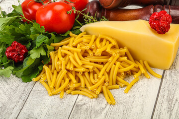 Italian pasta raw Maccheroni for cooking