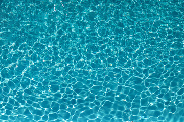 The excitement of the water in the pool. The texture of the surface of the blue pool, the...