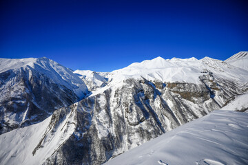 The Caucasus Mountains is a mountain range at the intersection of Asia and Europe. Stretching between the Black Sea and the Caspian Sea