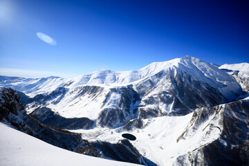 The Caucasus Mountains is a mountain range at the intersection of Asia and Europe. Stretching between the Black Sea and the Caspian Sea