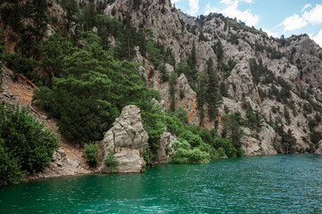 A feeling of complete freedom, a beautiful view of nature with a fjord and mountains in the water. Artistic nature. copy space.