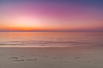 Colorful sky ocean beach sunrise with dramatic motivational mood. Tropical island seaside, coastal landscape, exotic beach shore, sea horizon. Inspire happy closeup of sand, beautiful summer travel