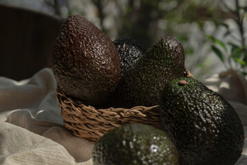 Avocado put in handmade bamboo basket.