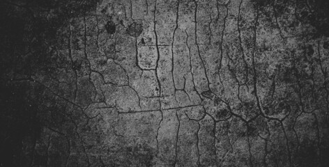 Black grainy stone texture backgroundor dark gray textured background.