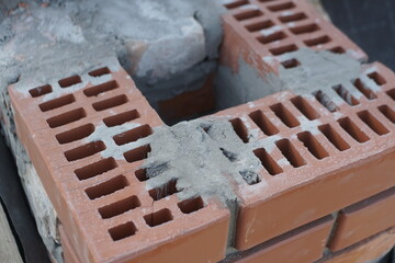 the beginning of the chimney is made of brick 