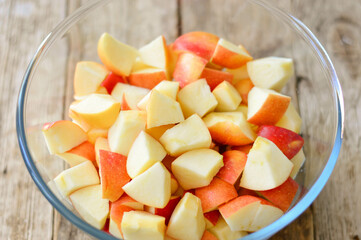 Chopped apples on wooden table